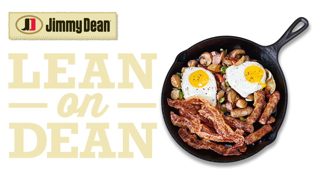 Skillet filled with potatoes, eggs, bacon and sausage