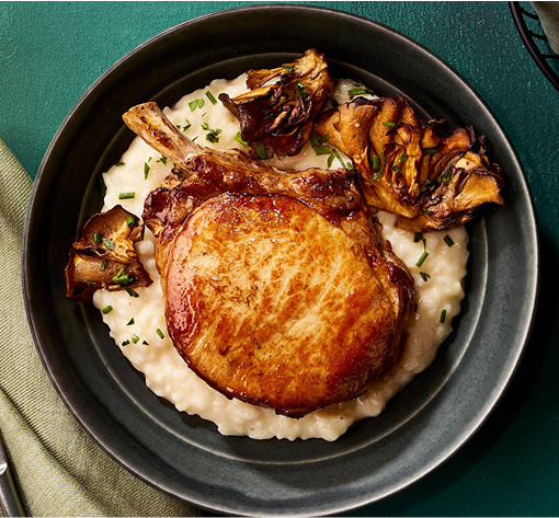 Pork chop on a bed of rice