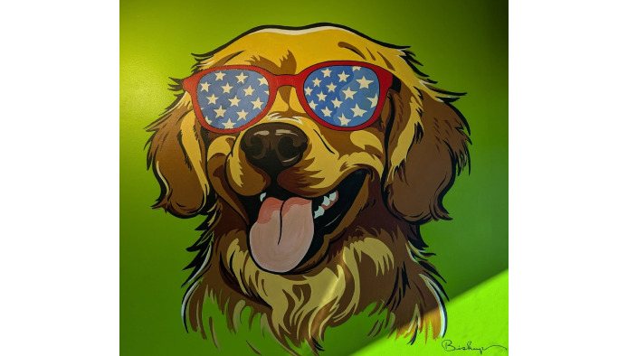 A painting of a happy golden retriever wearing sunglasses patterned like the American flag