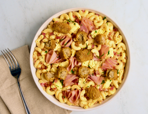 Breakfast Mac Attack Bowl featuring Bacon Pieces and Sausage Tots, and Sliced Canadian Brand Pork Roll