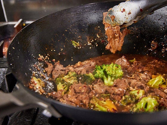 Sirloin Beef Flat Steak with Broccoli tossed with soy ginger garlic sauce and garnished with sesames