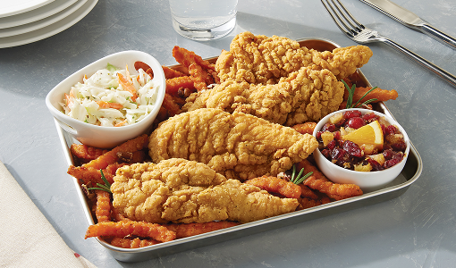 Sweet Southern Pecan Chicken Tenders with a side of french fries and slaw
