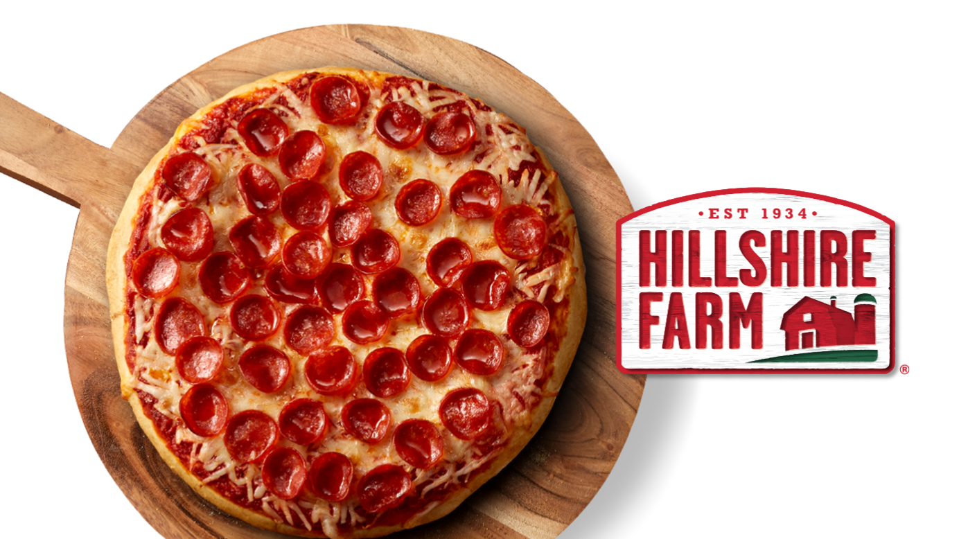 2024 Great Pizza Give Back Pepperoni pizza on a wooden plate