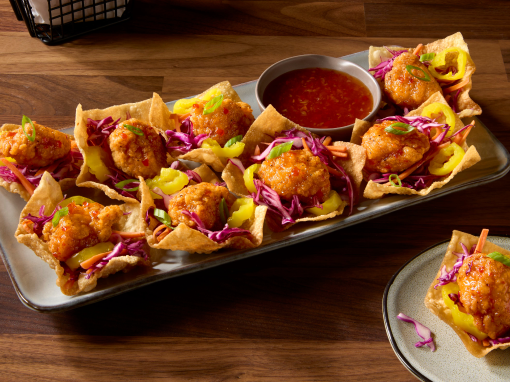 Wonton nachos topped with crispy chicken bites