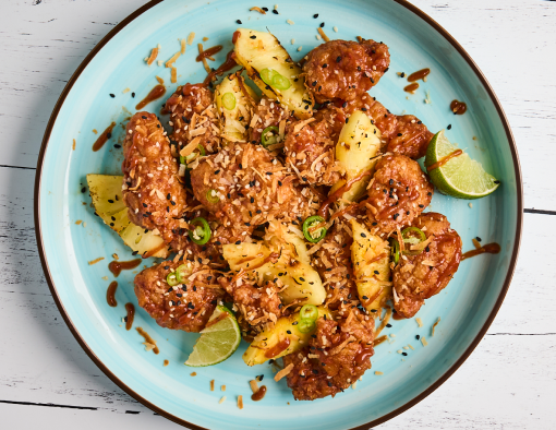 Swicy Island Boneless Wings Recipe on a blue plate.