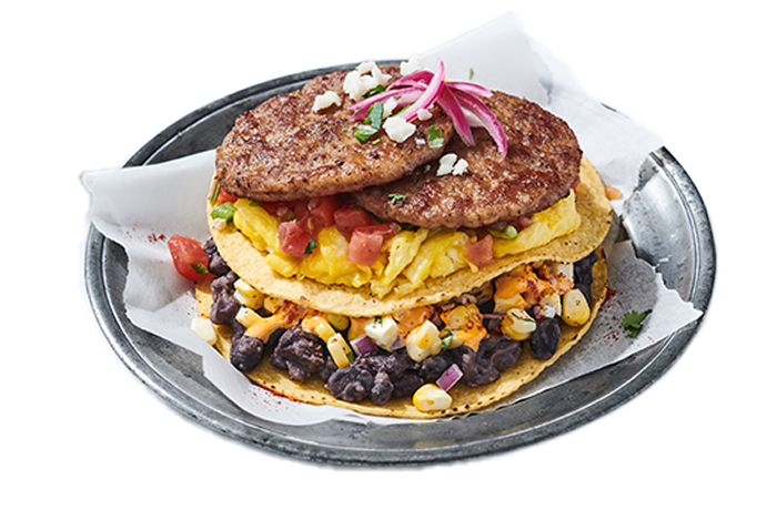 A breakfast tostada stack and sausage patties