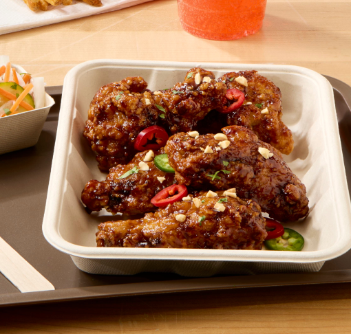 chicken wings in a to-go box