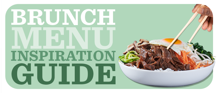 Hand using chopsticks for a heaping bowl of sliced beef, an over-easy egg, vegetables and noodles