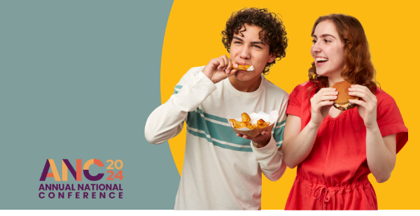 ANC 2024 curly hair guy tasting food and girl holding a cheeseburger