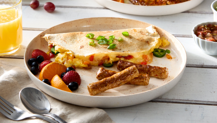 A breakfast quesadilla, some fruit and Jimmy Dean® Low Sodium Chicken Breakfast Skinless Sausage Links
