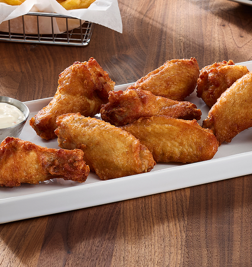 bone-in chicken wings and sauce