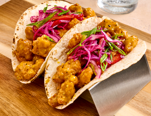 Carolina Gold BBQ Chicken Tacos on a cutting board