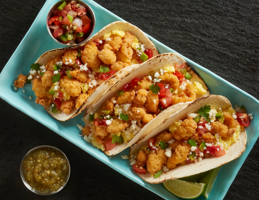 Tyson® Mini Chicken Bites on fresh and crispy breakfast tacos