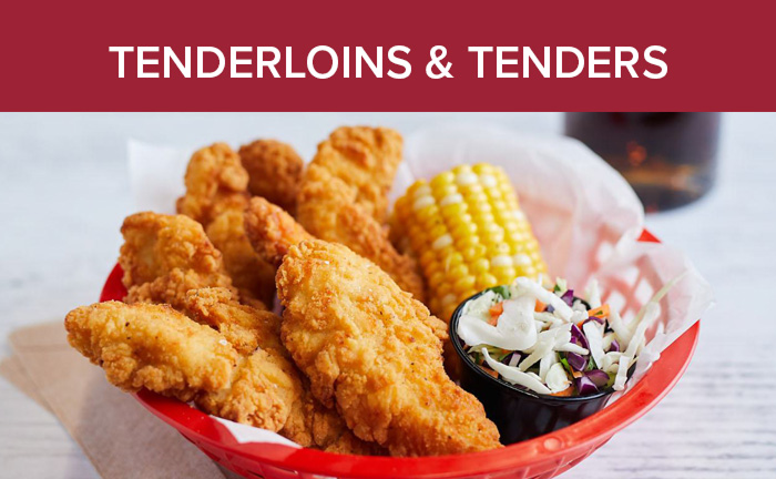 A basket of chicken tenders served with corn on the cob