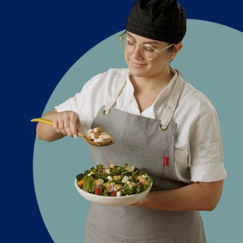 Chef preparing salad.