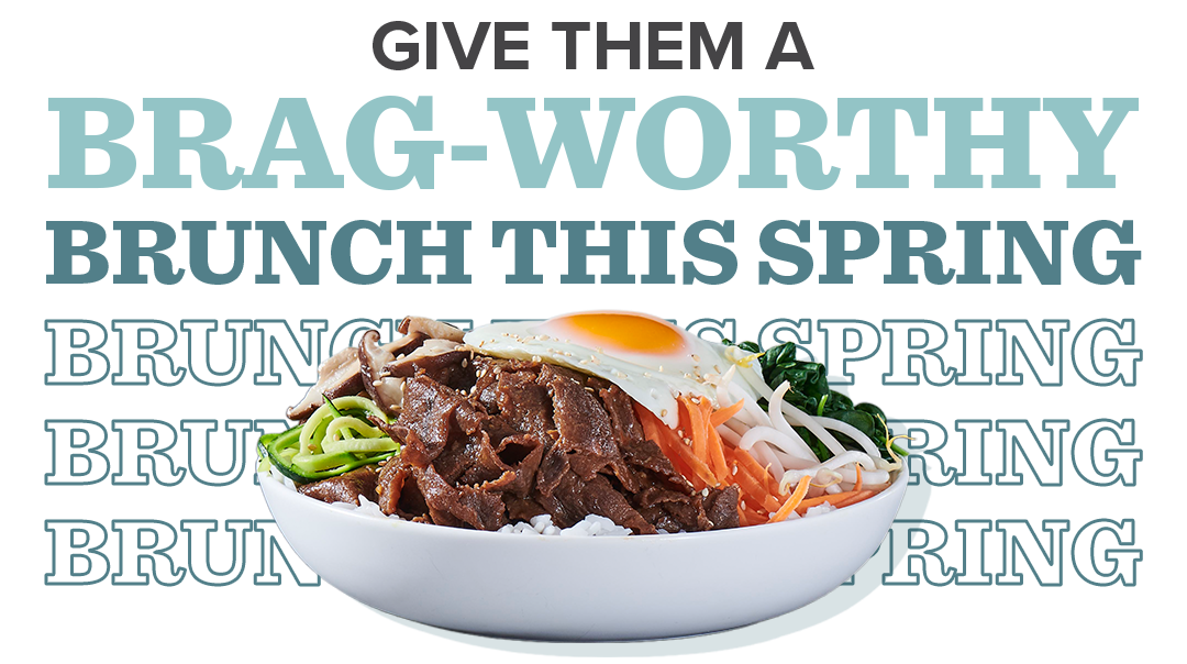 A bowl of sliced beef and veggies topped with an egg