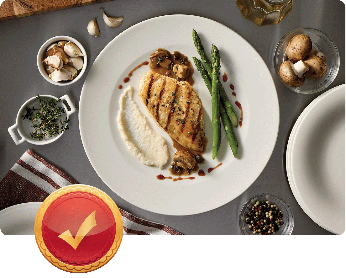 grilled chicken breast, asparagus spears, mushrooms and sauce along with side dishes of premium ingredients