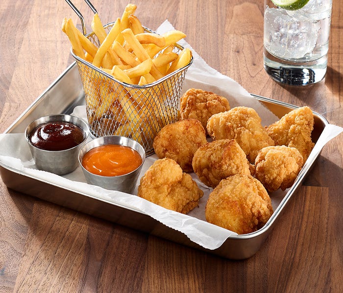 chicken breast chunk fritters, sauces, fries and beverage