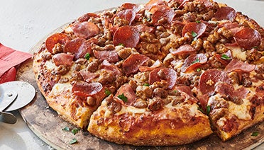 Sausage, pepperoni, ham pizza image
