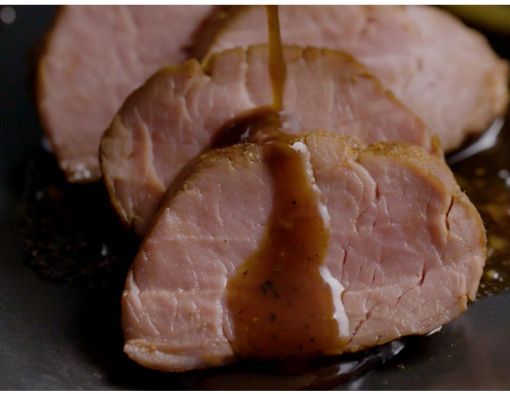 Pan Seared and Sliced Glazed Pork Tenderloin on a Plate